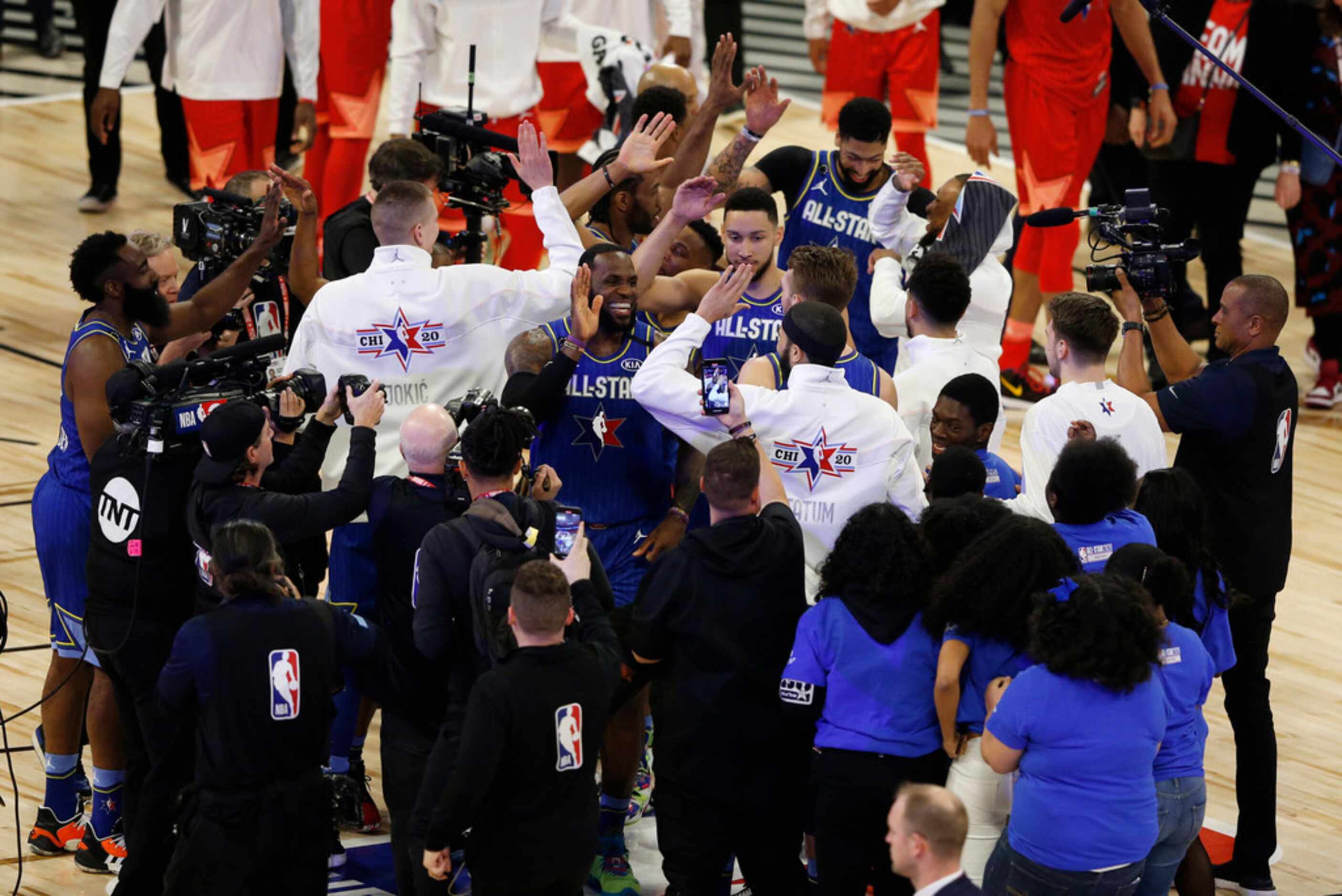 Team LeBron's LeBron James (2) celebrates with Jayson Tatum and teammates after defeating...