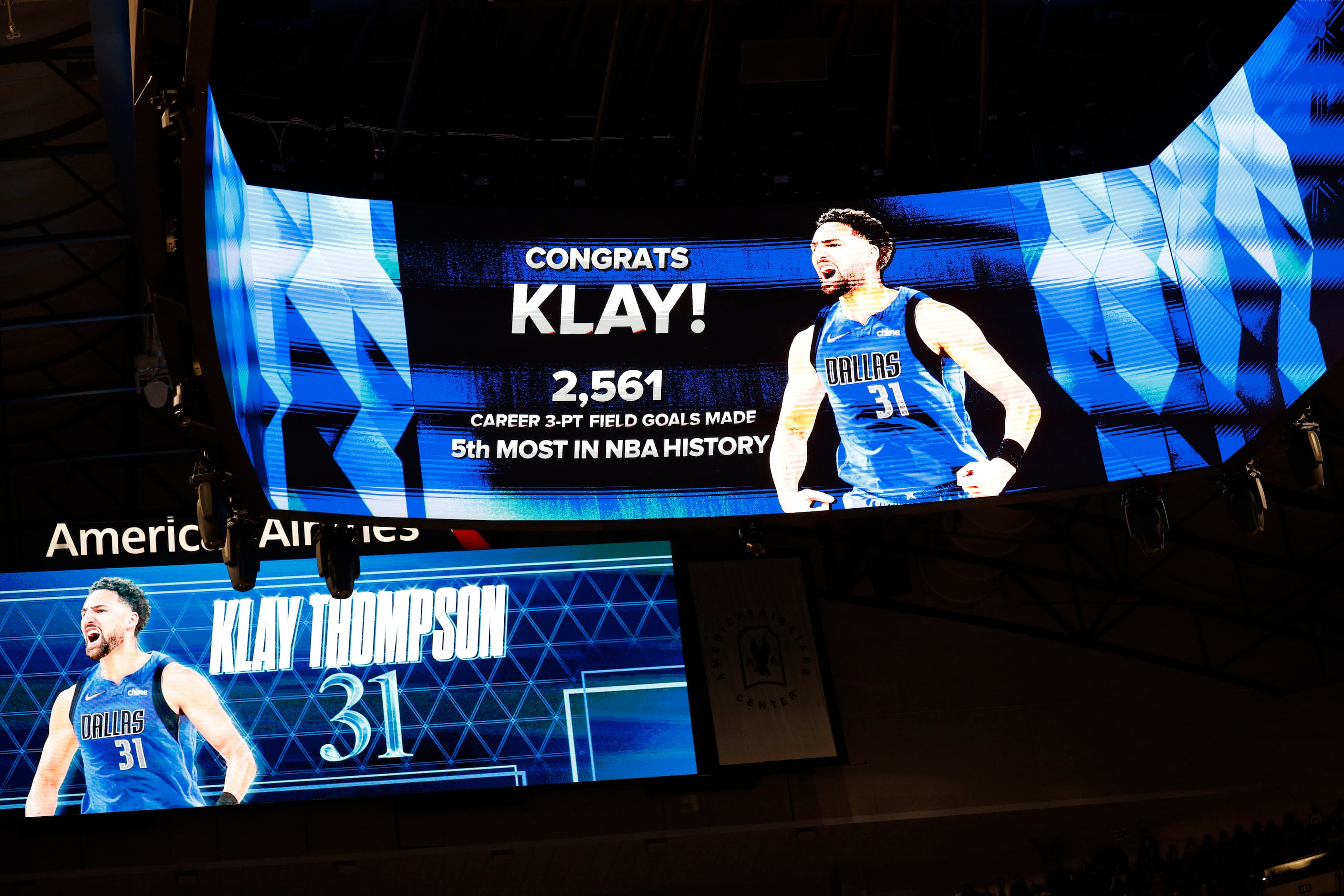 The score board screen shows Dallas Mavericks guard Klay Thompson (31) after scoring a...