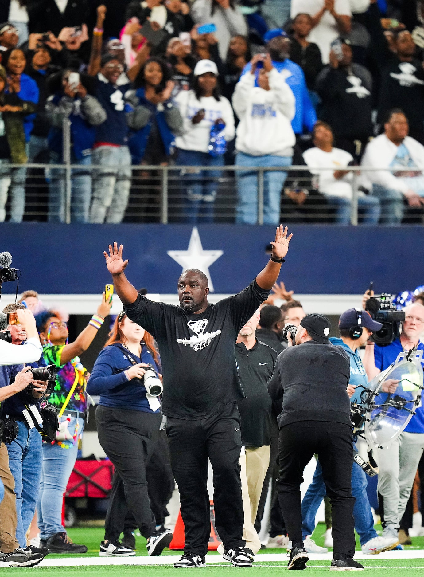 North Crowley head coach Ray Gates celebrates as time expires on a victory over Austin...