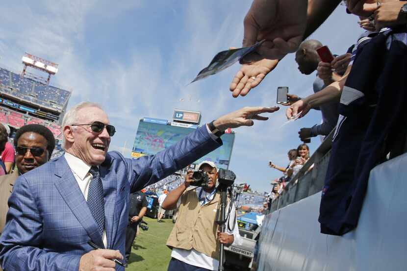 Dallas Cowboys owner Jerry Jones signs autographs for fans before the Dallas Cowboys vs. the...