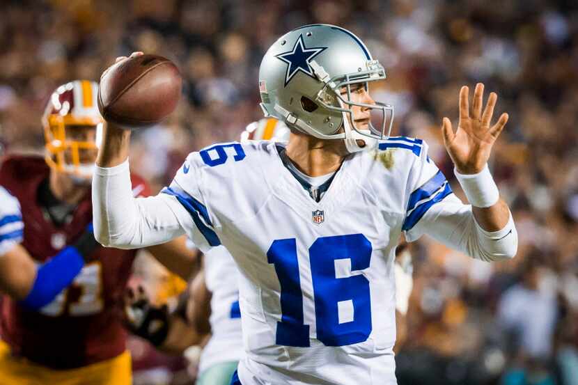 Dallas Cowboys quarterback Matt Cassel (16) throws a pass during the first half of an NFL...