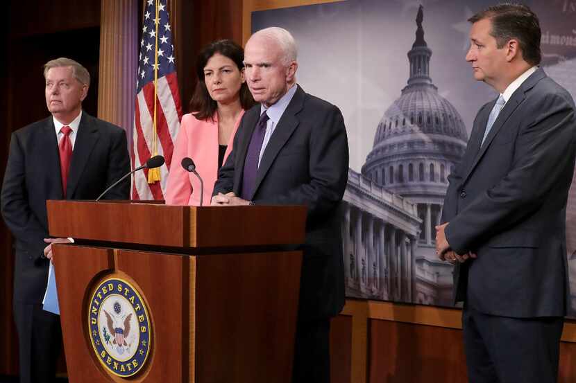 From left: Sens. Lindsey Graham, Kelly Ayotte, John McCain and Ted Cruz held a news...