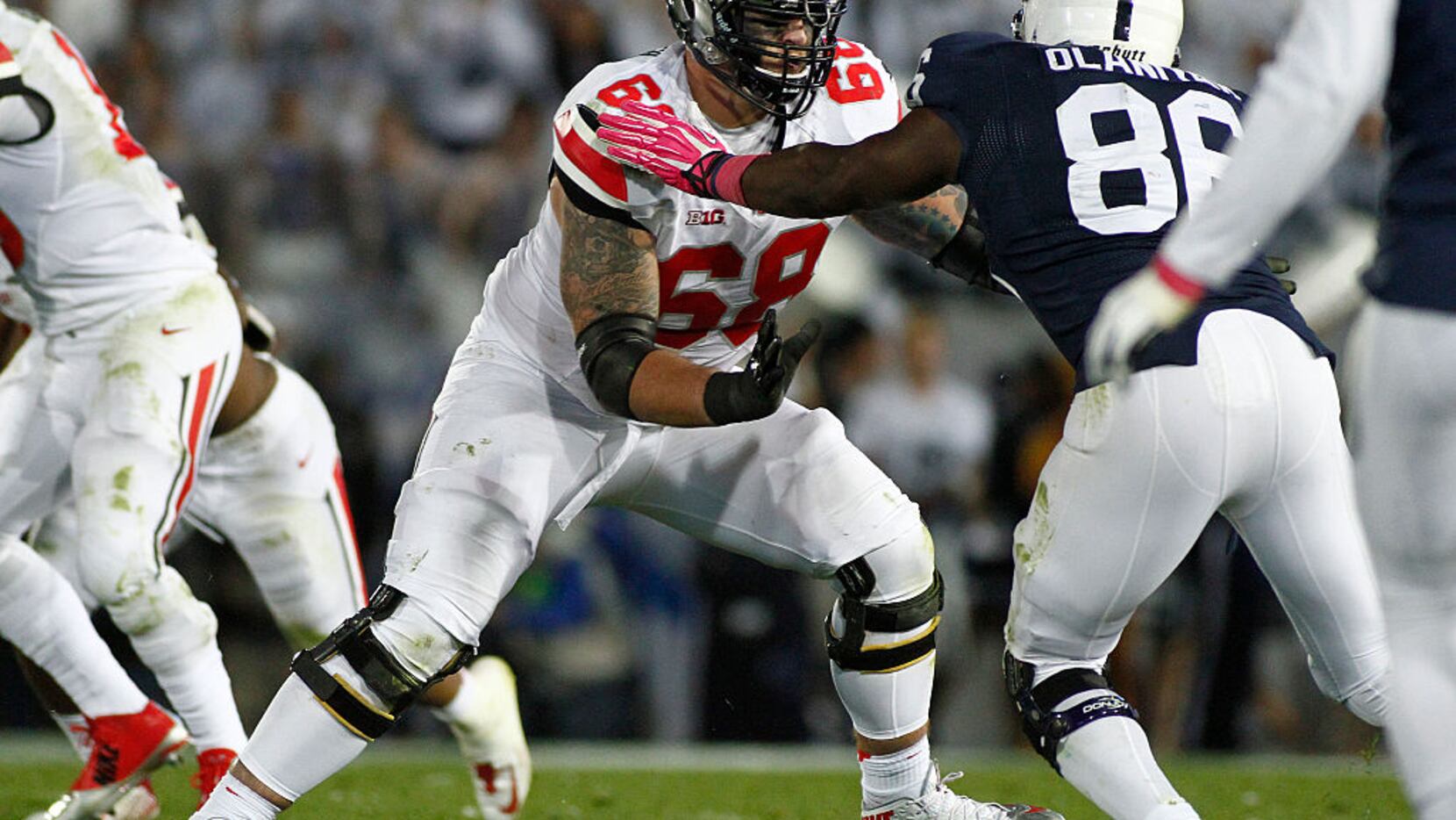 STATE COLLEGE, PA - OCTOBER 25:  Taylor Decker #68 of the Ohio State Buckeyes blocks during...