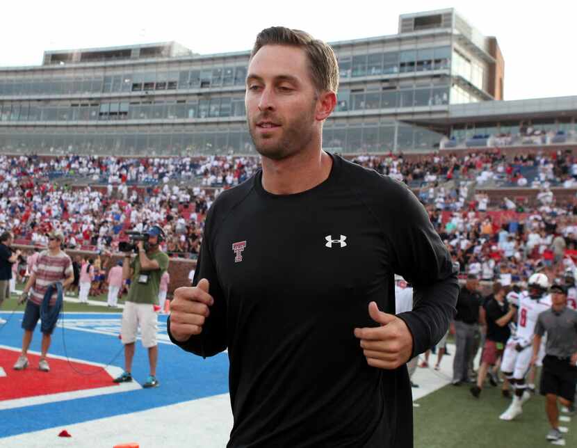 Texas Tech Red Raiders head coach Kliff Kingsbury takes the field in NCAA college football...