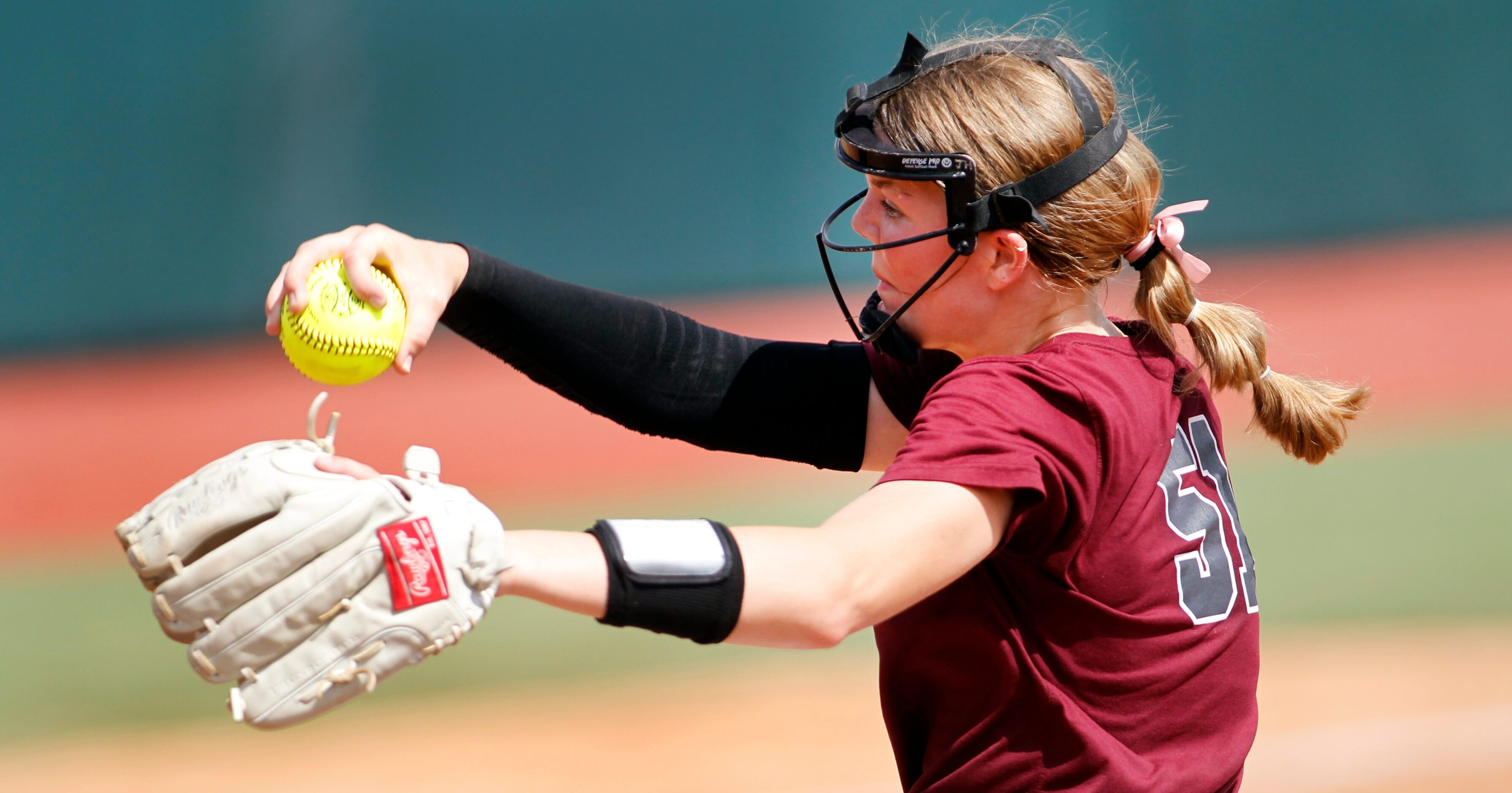 Frisco Heritage pitcher Jensin Hall (51) delivers a pitch to a Montgomery Lake Creek batter...