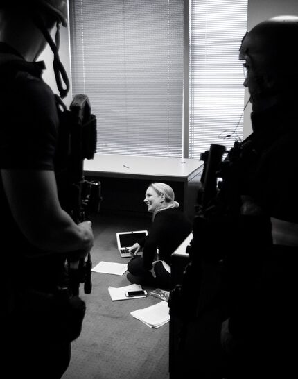 Writer Jamie Thompson visits with Dallas police department SWAT team members on Wednesday,...