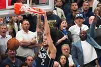 Dallas Mavericks center Dereck Lively II (2) dunks the ball during the first half in Game 4...