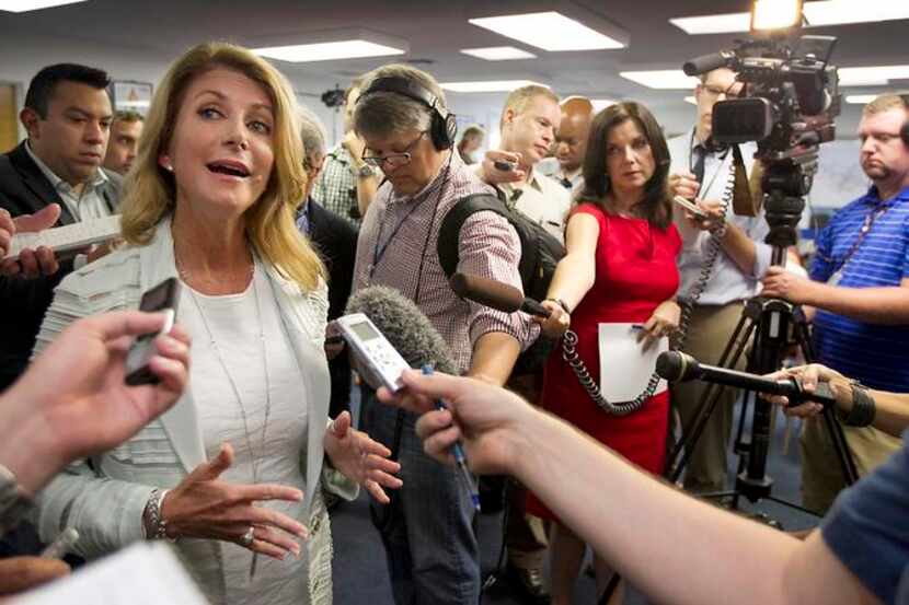 
Wendy Davis, Democratic candidate for Texas governor, spoke to the media last week during a...