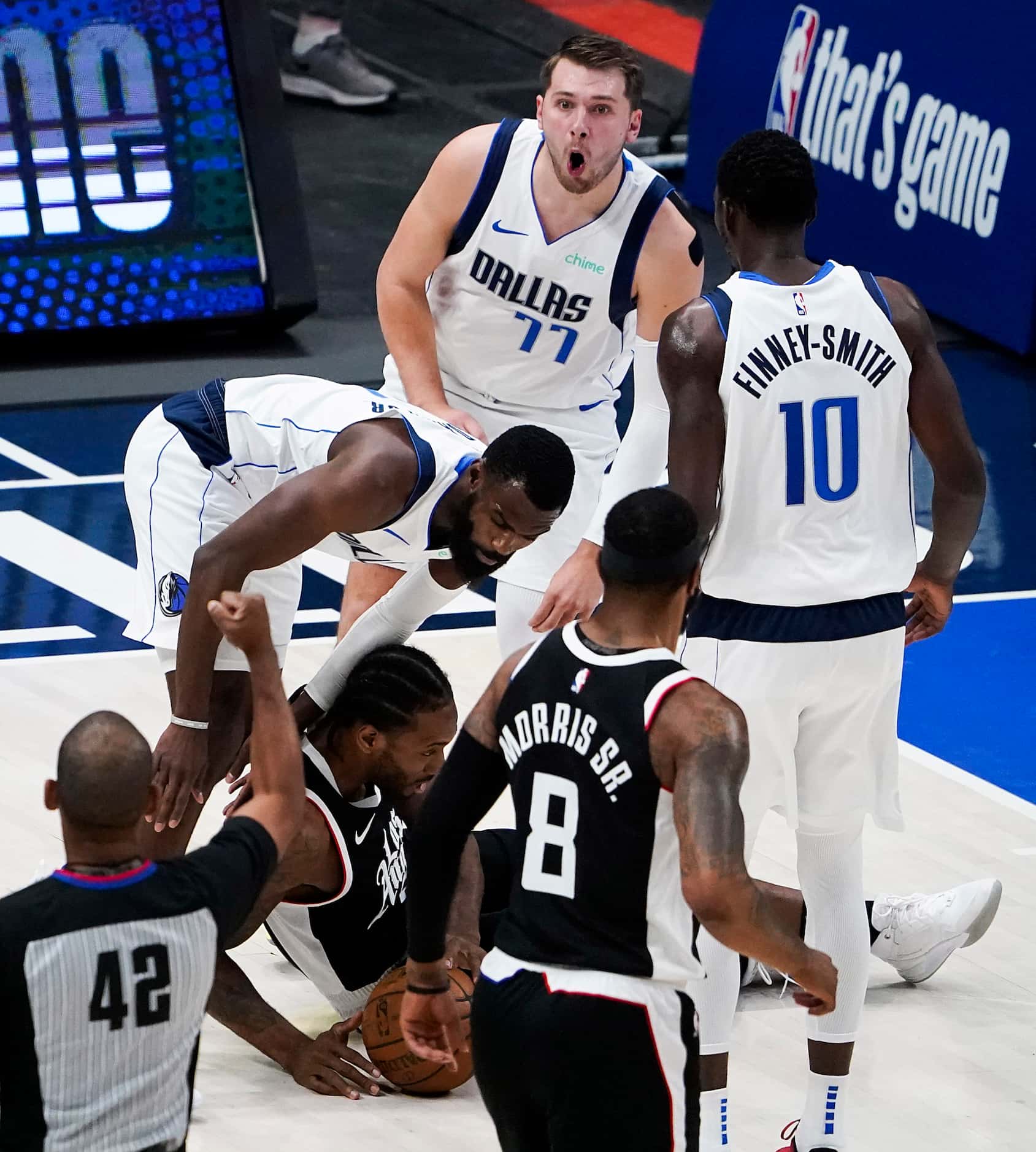 Dallas Mavericks guard Luka Doncic (77) reacts after being called for a foul against LA...
