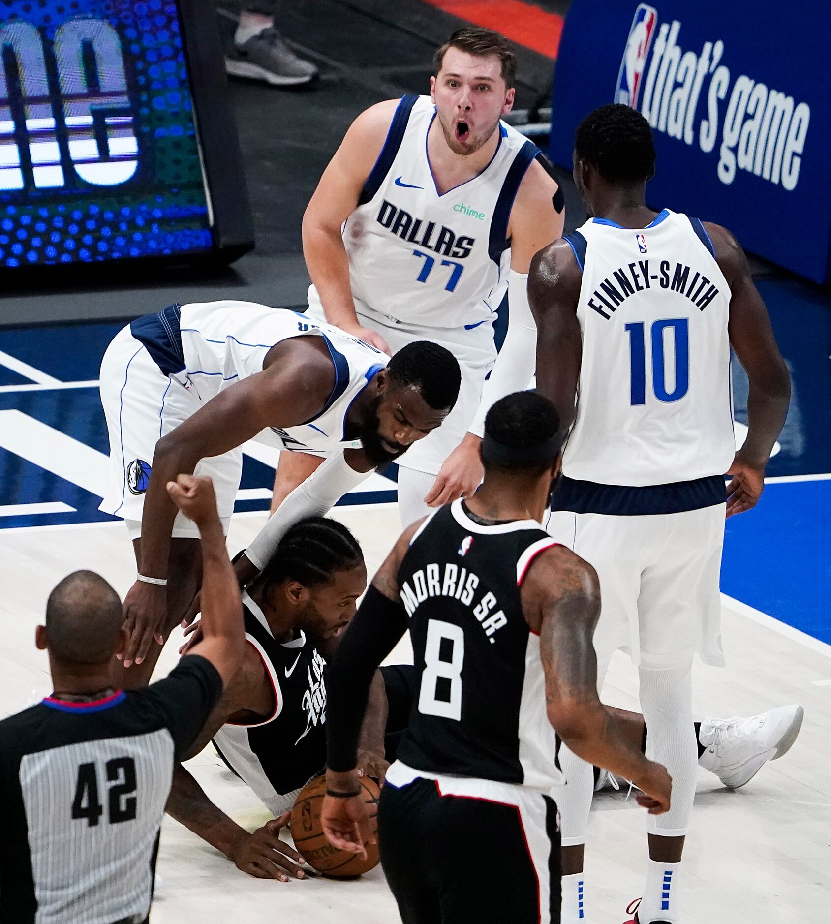 Dallas Mavericks guard Luka Doncic (77) reacts after being called for a foul against LA...