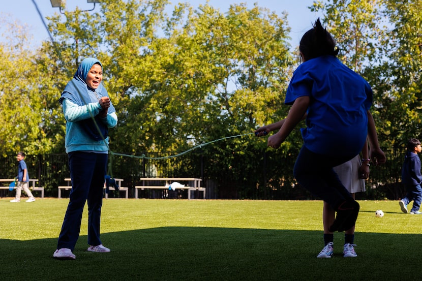 Dilnar Dilmodommad cheered on students jumping rope on the first day of Heart House on...