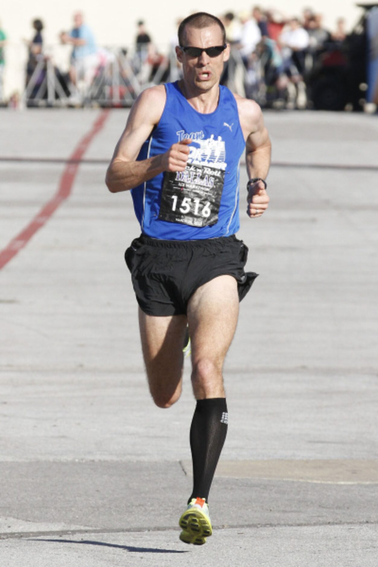 Jonathan Pillow runs in the Dallas Rock 'N' Roll half marathon on Sunday, March 25, 2012.