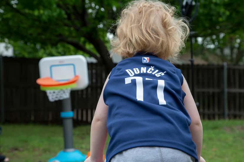 Luka Miller, 2, named after Dallas Mavericks’ guard Luka Doncic, plays in his backyard at...