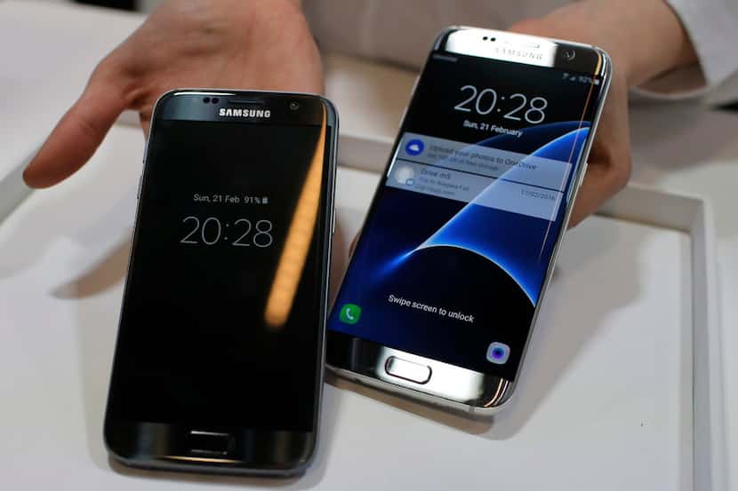 Samsung Galaxy S7, left, and S7 Edge are displayed during the Samsung Galaxy Unpacked 2016...