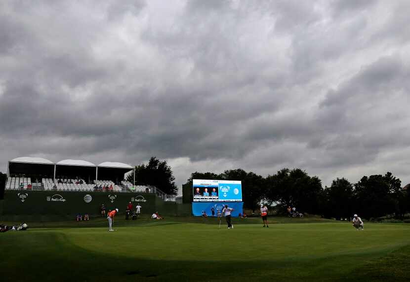 Dark clouds moved in over the 17th green during the second round of the AT&T Byron Nelson...