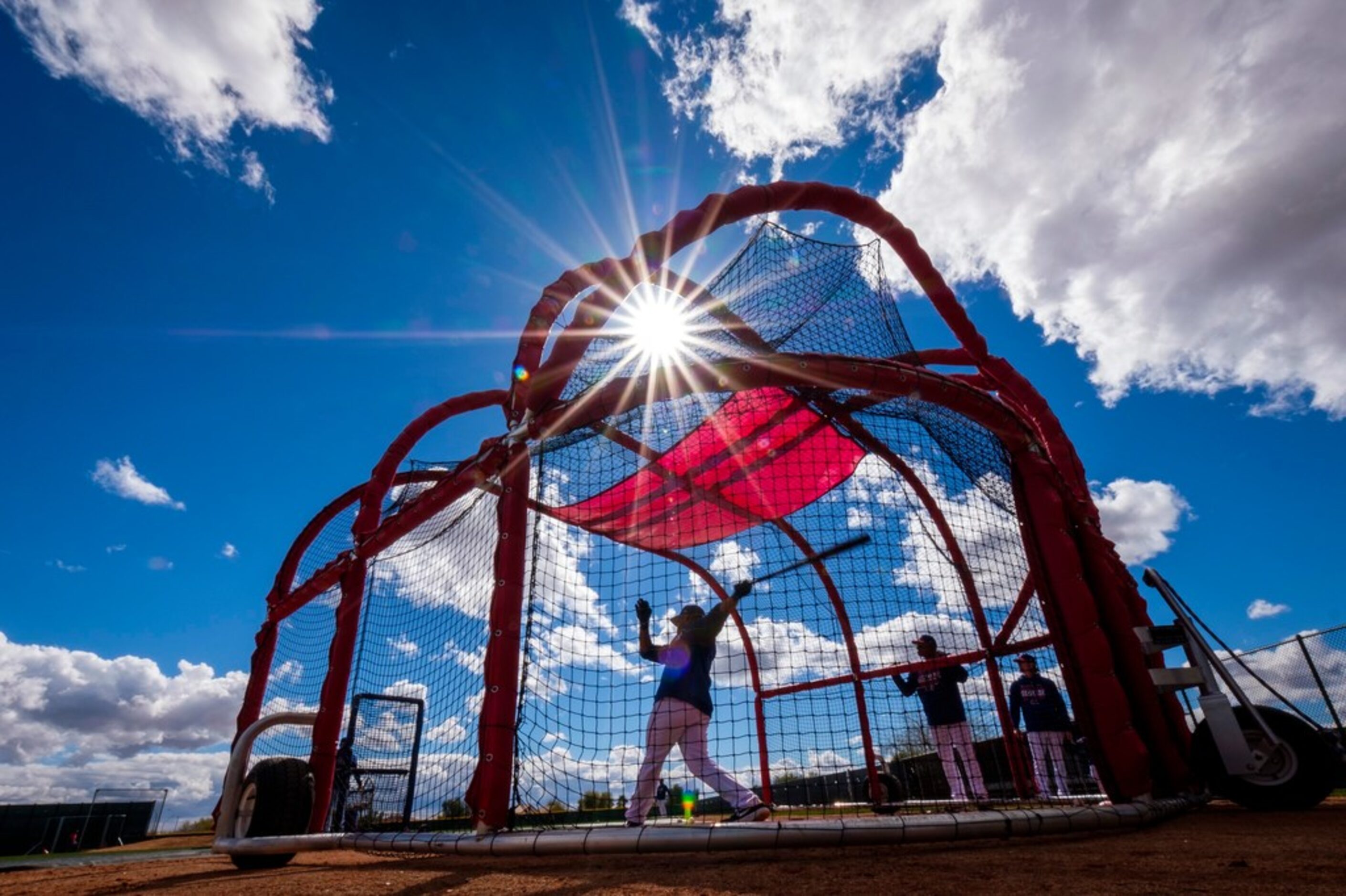 Texas Rangers infielder Andy Ibanez hits a batting cage during the first full squad spring...