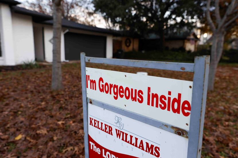 A “for sale” sign is displayed outside of a house in Carrollton. Real estate agents sold...
