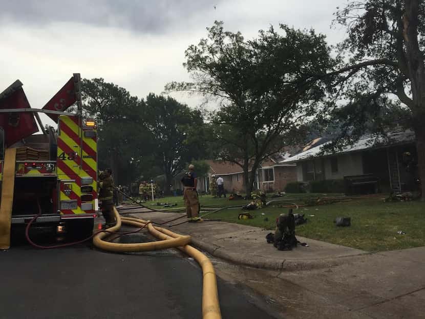  Dallas firefighters dealt with two house fires on Regent Drive near Webb Chapel Road...