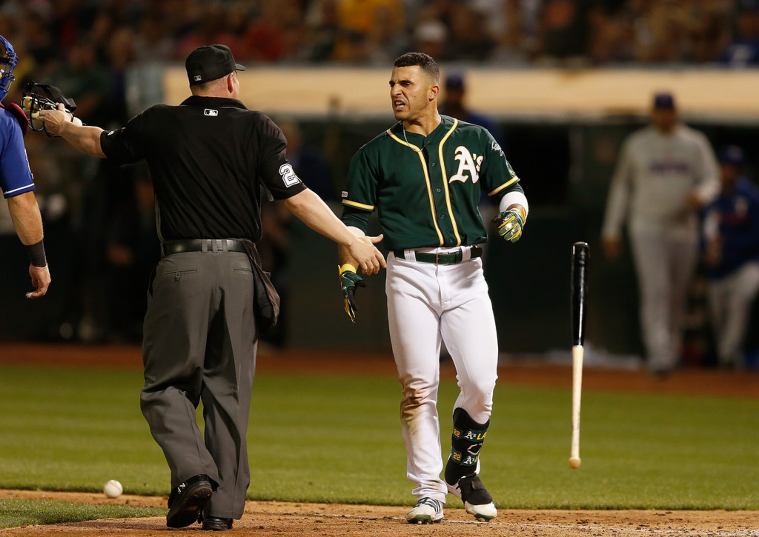 OAKLAND, CALIFORNIA - JULY 27: Ramon Laureano #22 of the Oakland Athletics reacts after...