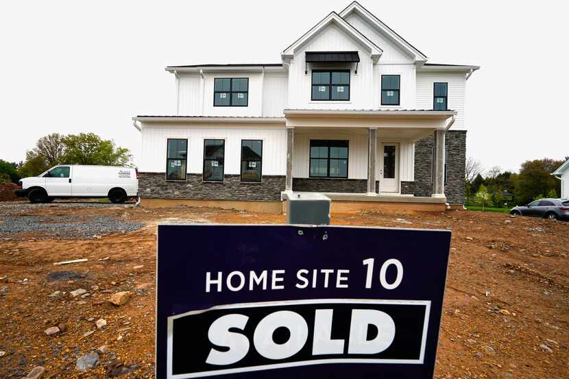FILE - A home under construction marked as "SOLD" at a development in Eagleville, Pa., is...