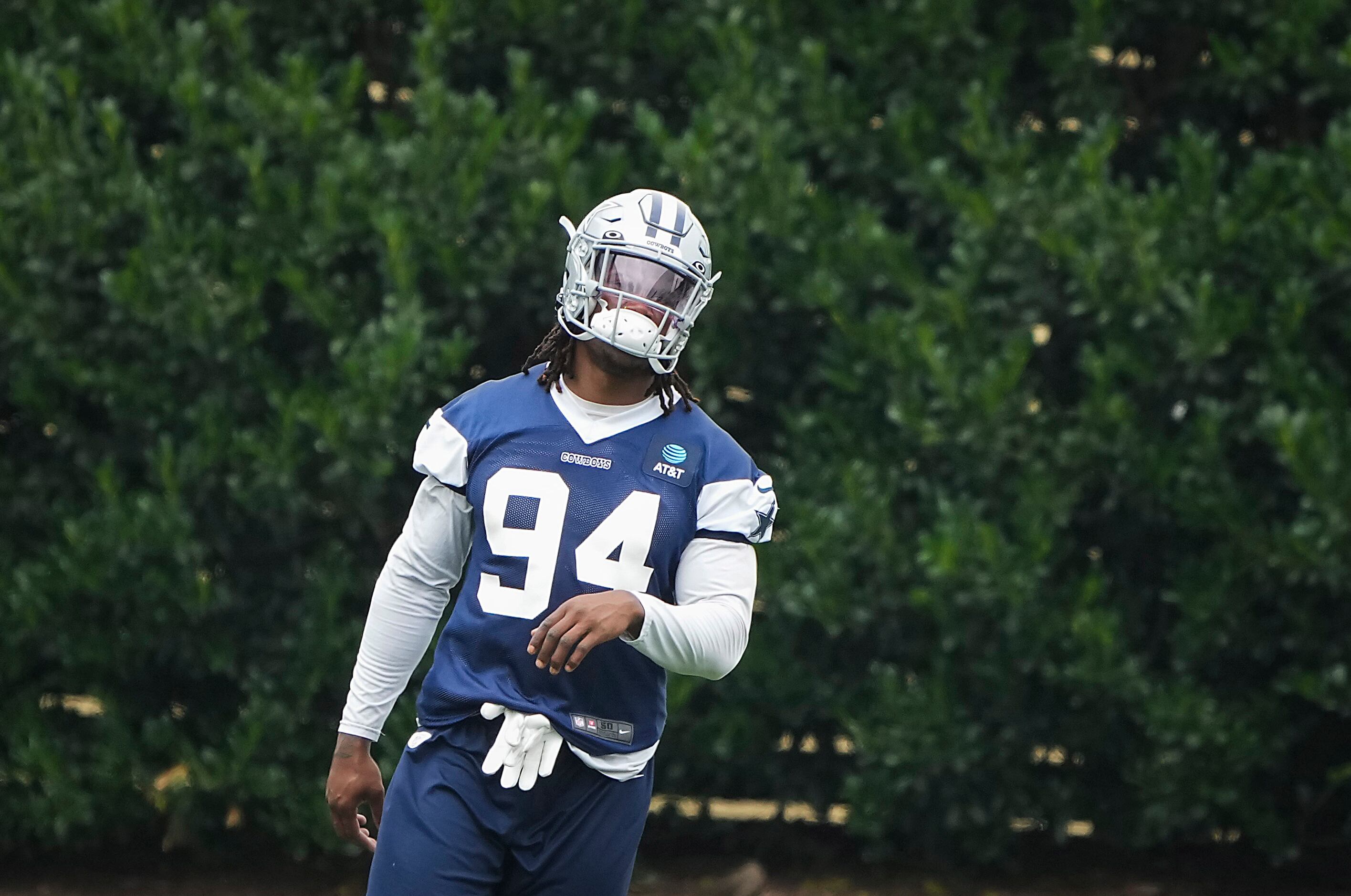 Dallas Cowboys defensive end Randy Gregory (94) participates in a drill during a minicamp...