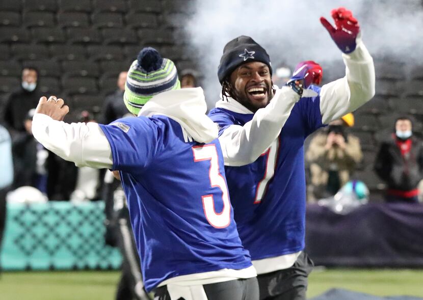 NFC cornerback Trevon Diggs of the Dallas Cowboys celebrates with Seattle  Seahawks Russell Wilson after competing in the Best Catch event at the 2022  Pro Bowl Skills Showdown Wednesday, February 2, 2022