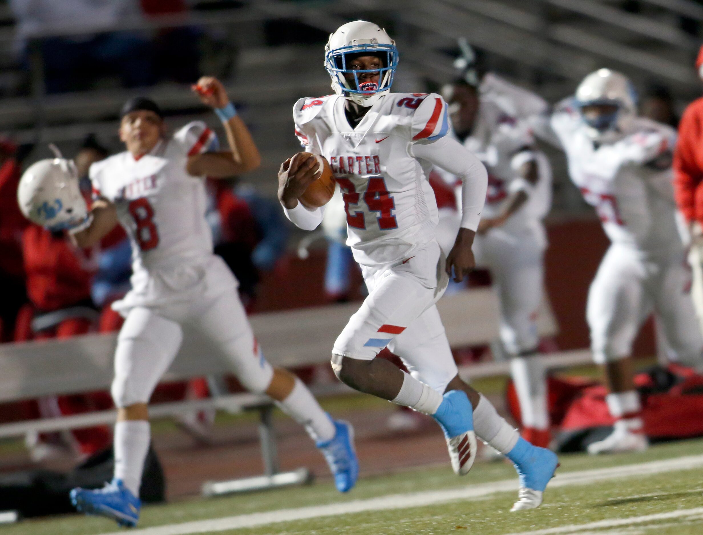 Dallas Carter defensive back Samaj Maston (24) scoops up a fumble and returns it for a...