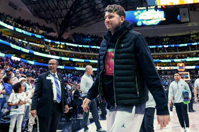 Dallas Mavericks guard Luka Doncic walks off the court after an NBA game against the New...