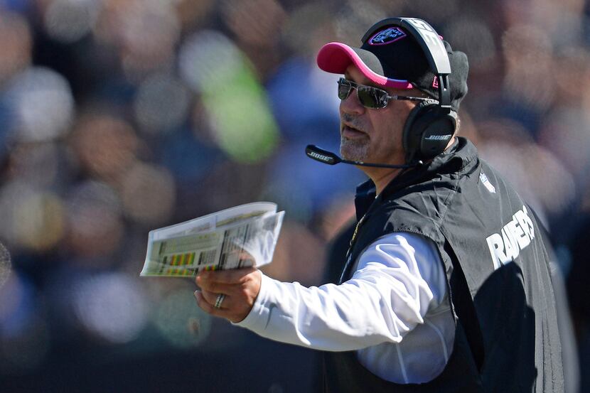 Oakland Raiders interim head coach Tony Sparano gestures from the sidelines during the...