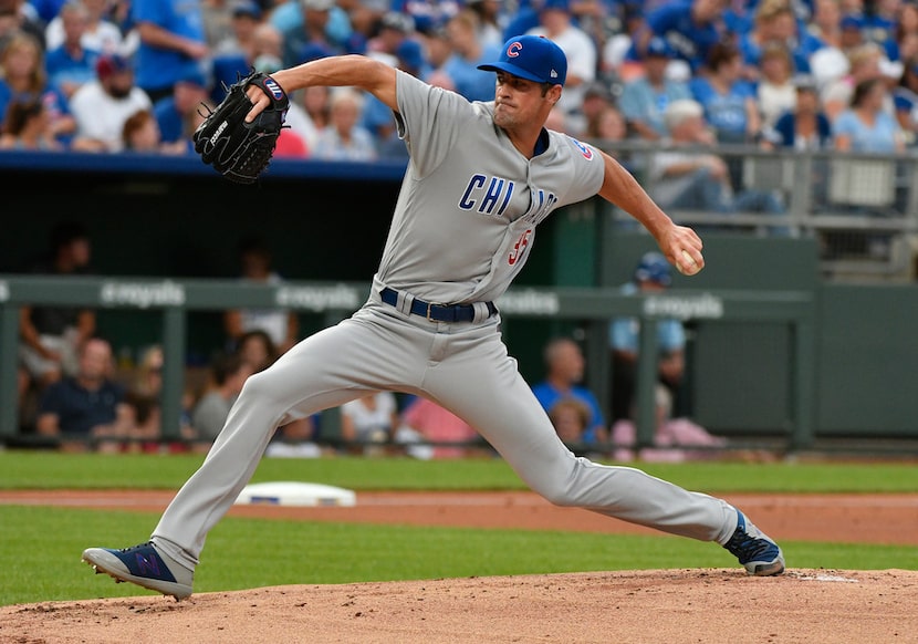 KANSAS CITY, MO - AUGUST 6: Cole Hamels #35 of the Chicago Cubs throws in the first inning...