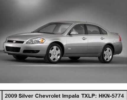 A picture of a stock silver Chevrolet Impala