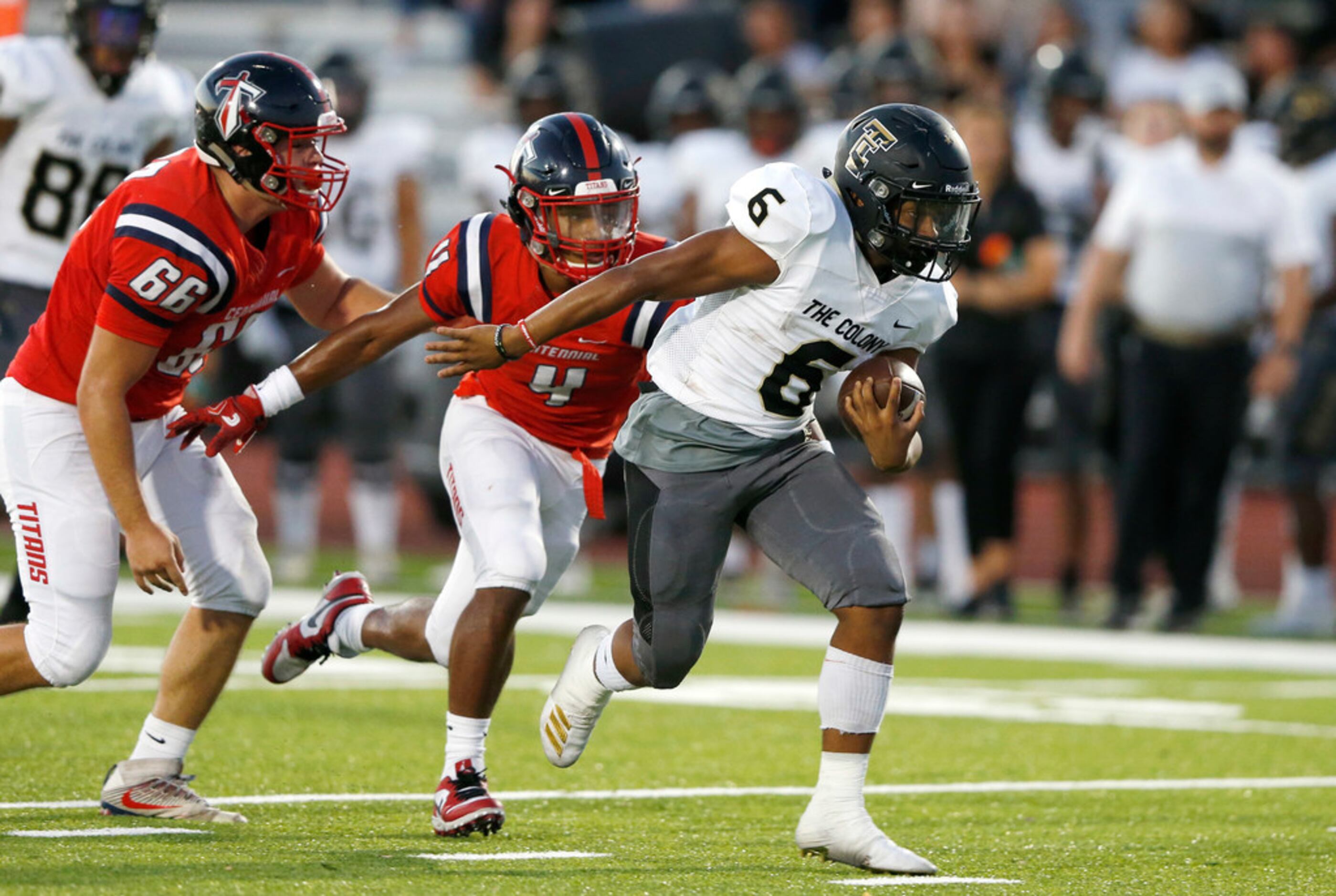 The Colony's Kamden Wesley (6) rushes up the field as he is chased by  Centennial's Ridge...
