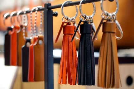 Leather tassels can include charms and pendants.
