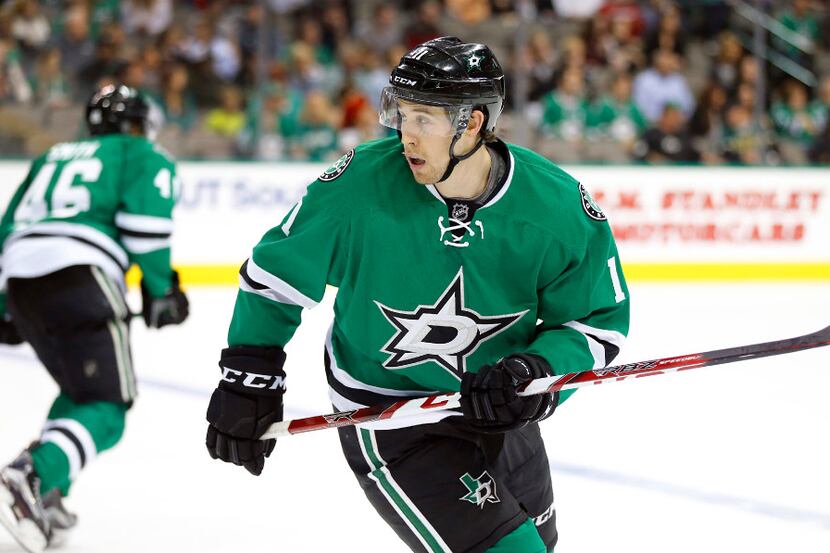 Dallas Stars left wing Curtis McKenzie (11) circles back to the bench during their game with...