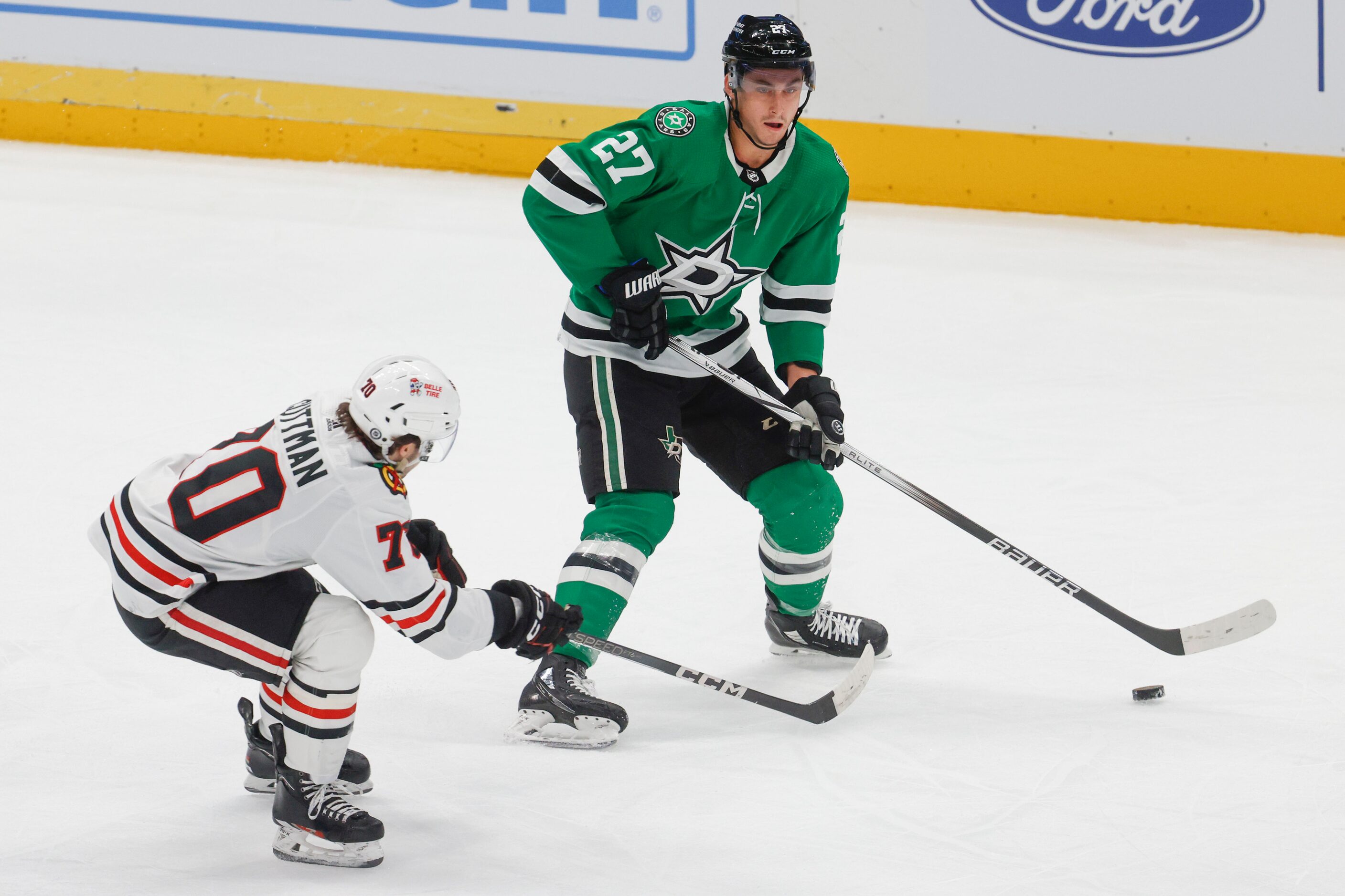 Dallas Stars left wing Mason Marchment (27) looks to pass past Chicago Blackhawks center...