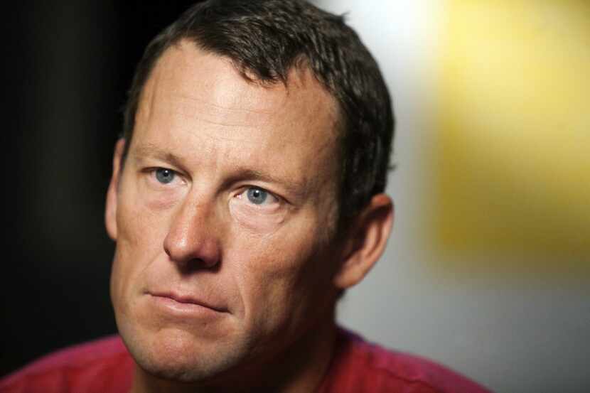 FILE - In this Feb. 15, 2011, file photo, Lance Armstrong pauses during an interview in...
