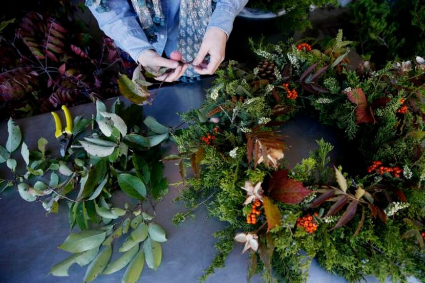 
Andi Jamison designs and assembles a wreath with materials foraged on Quarry Flower Farm.
