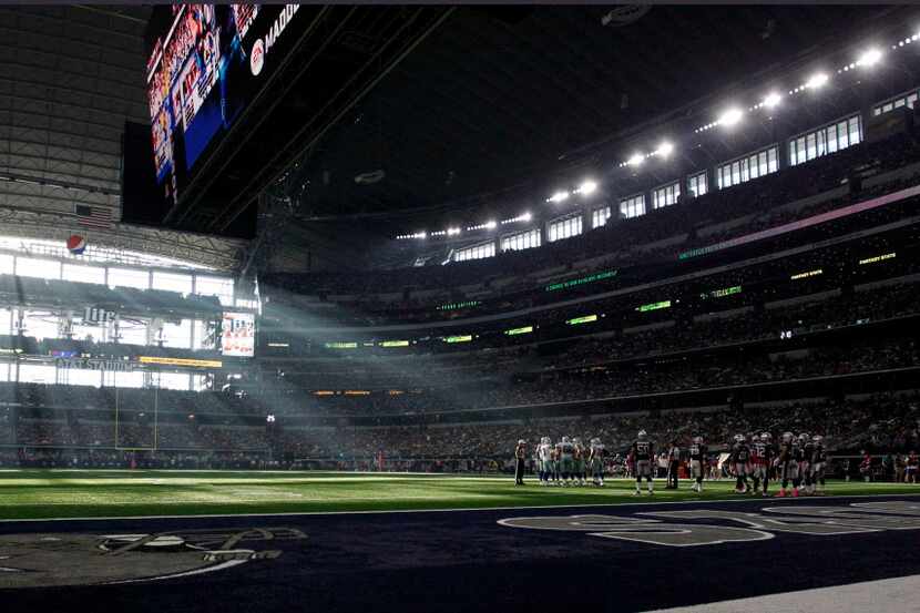 Dramatic window light floods the field during the second half of New England Patriots 30-6...