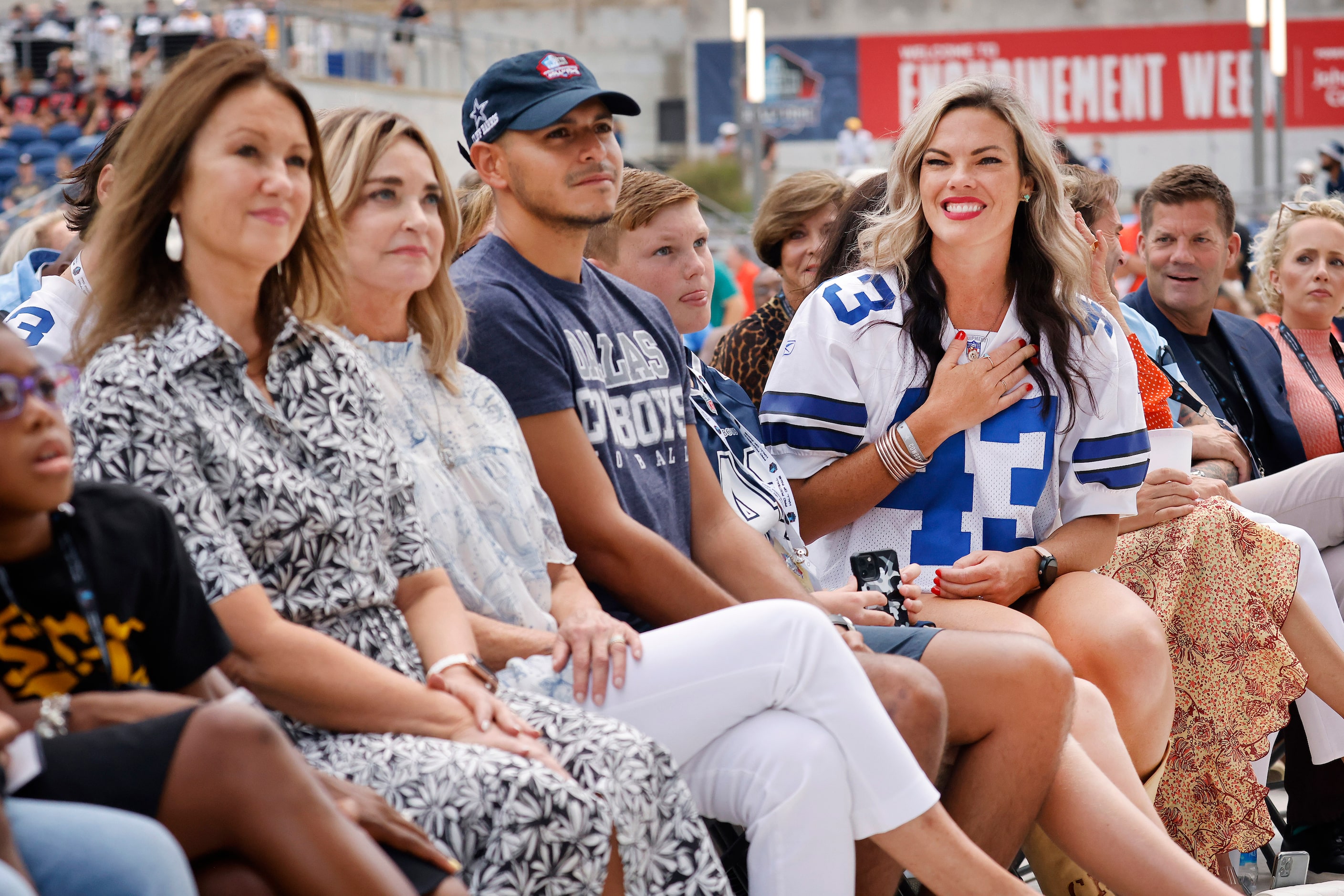 Pro Football Hall of Fame inductee Cliff Harris' daughter Alden Harris (right) reacts to her...