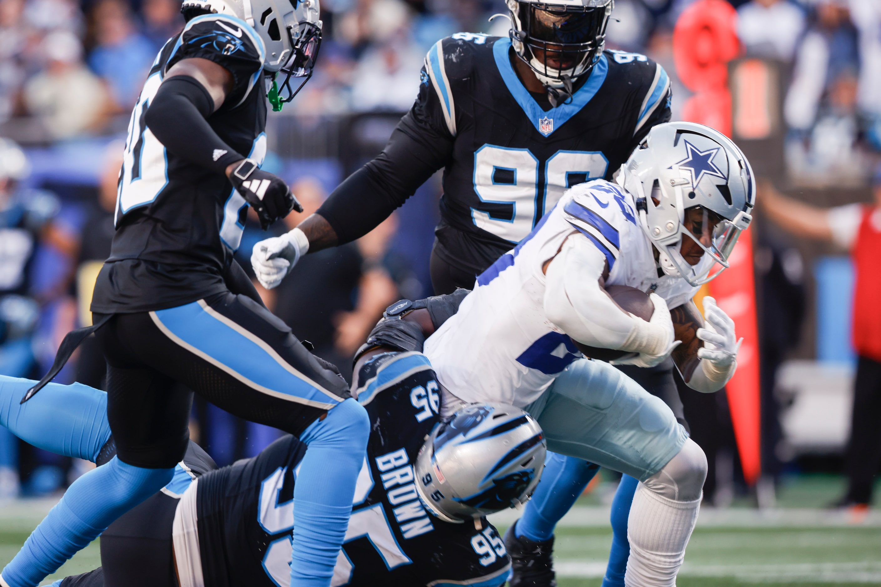 Dallas Cowboys running back Tony Pollard (20) runs up the middle for a touchdown during the...