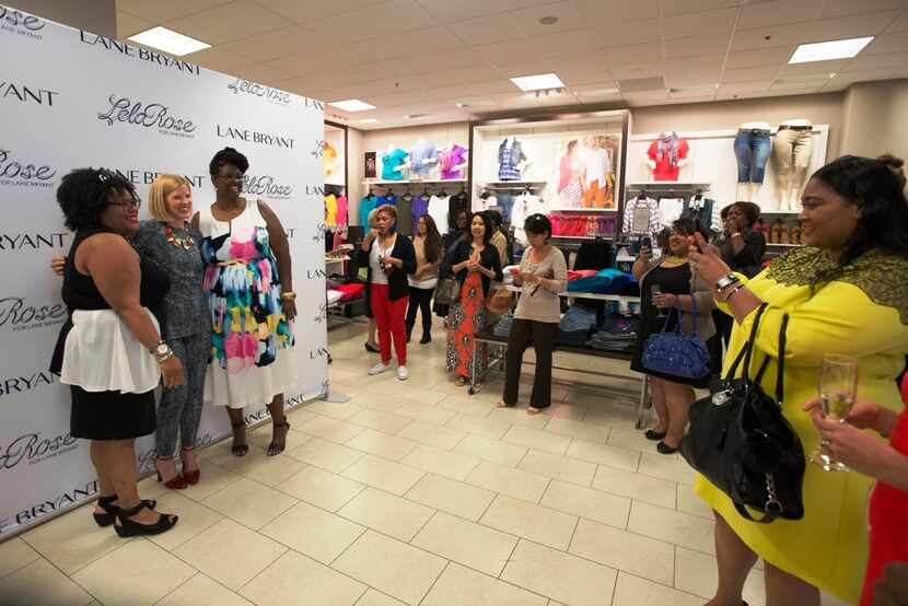  DALLAS, TX - APRIL 29: Lela Rose (C) poses for a photo with fans at Lane Bryant on April...