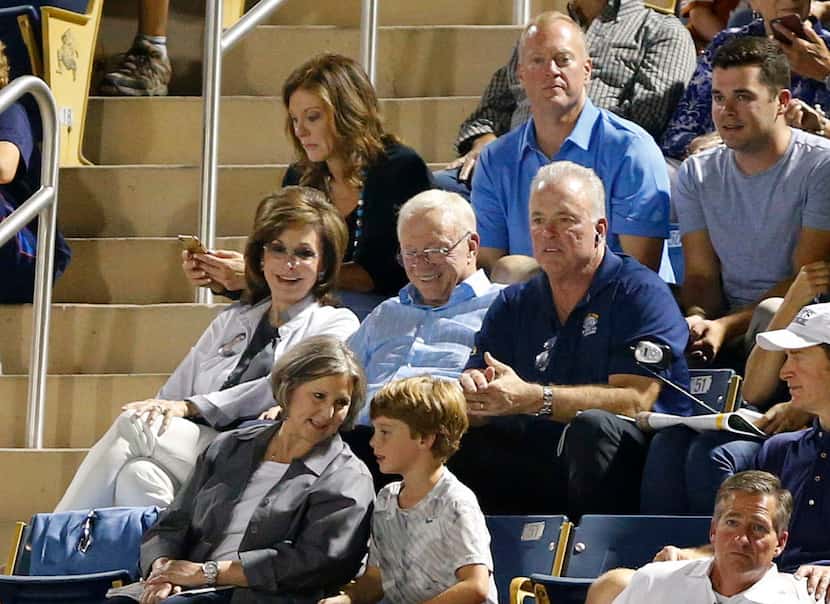 Dallas Cowboys owner Jerry Jones and his wife Gene are joined by their kids, from back left,...