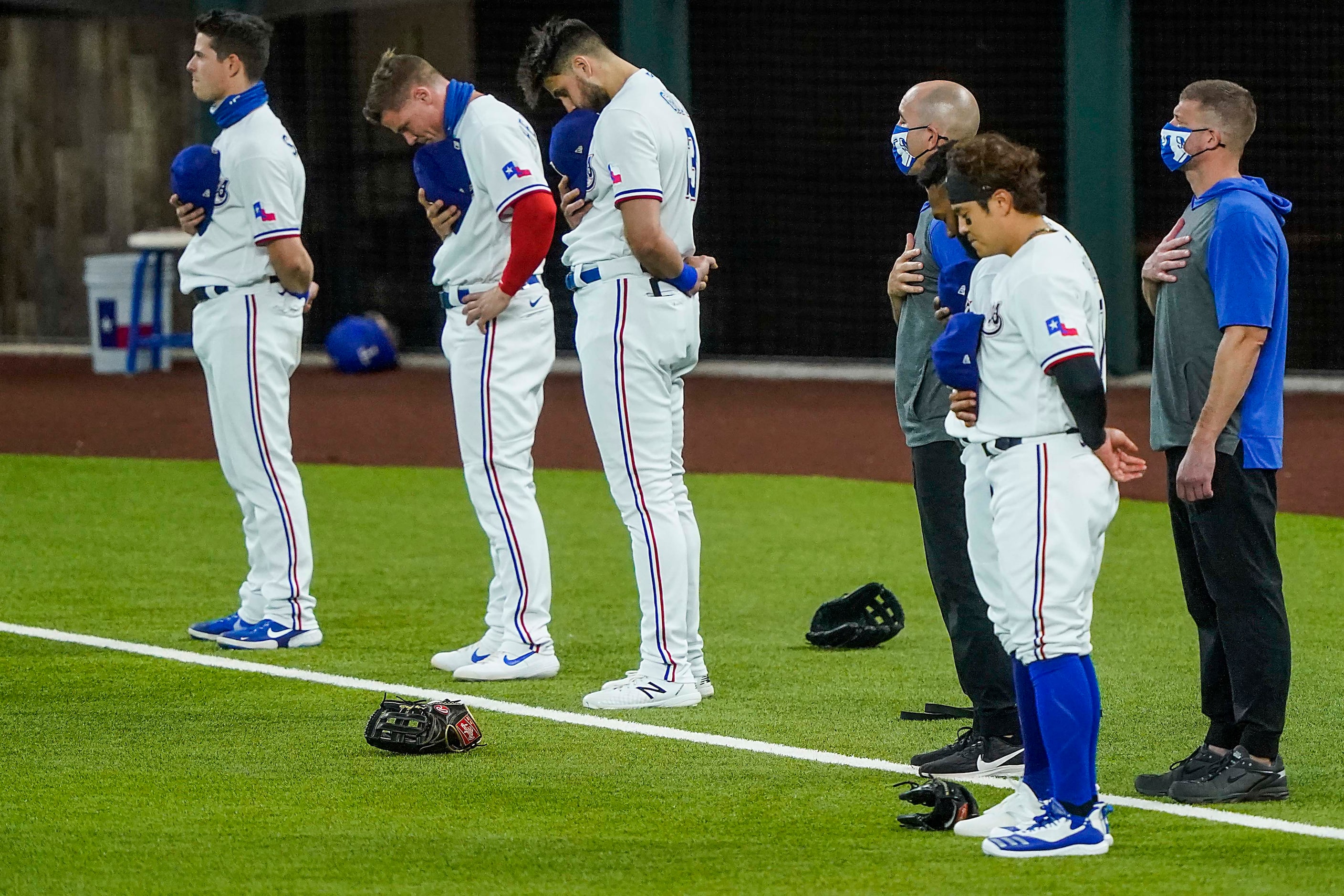 Texas Rangers players, including, from left, Nick Solak, Scott Heineman, Joey Gallo and...