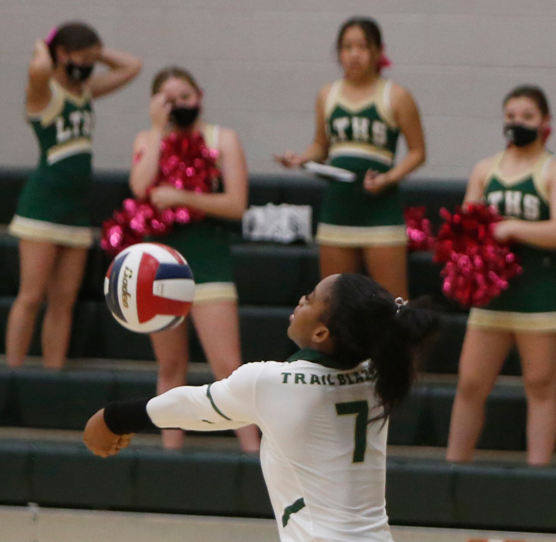 Frisco Lebanon Trail's Tyrah Ariail (7) makes an over the shoulder return during the first...