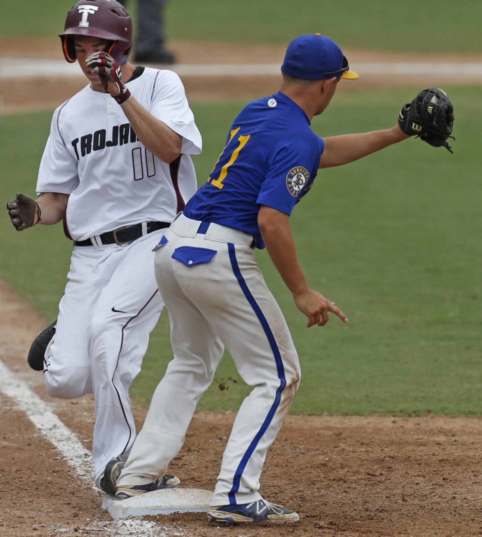 Troy's Rylan Cox (11) is out on a grounder as Sunnyvale's Joey Rosato makes the putout at...