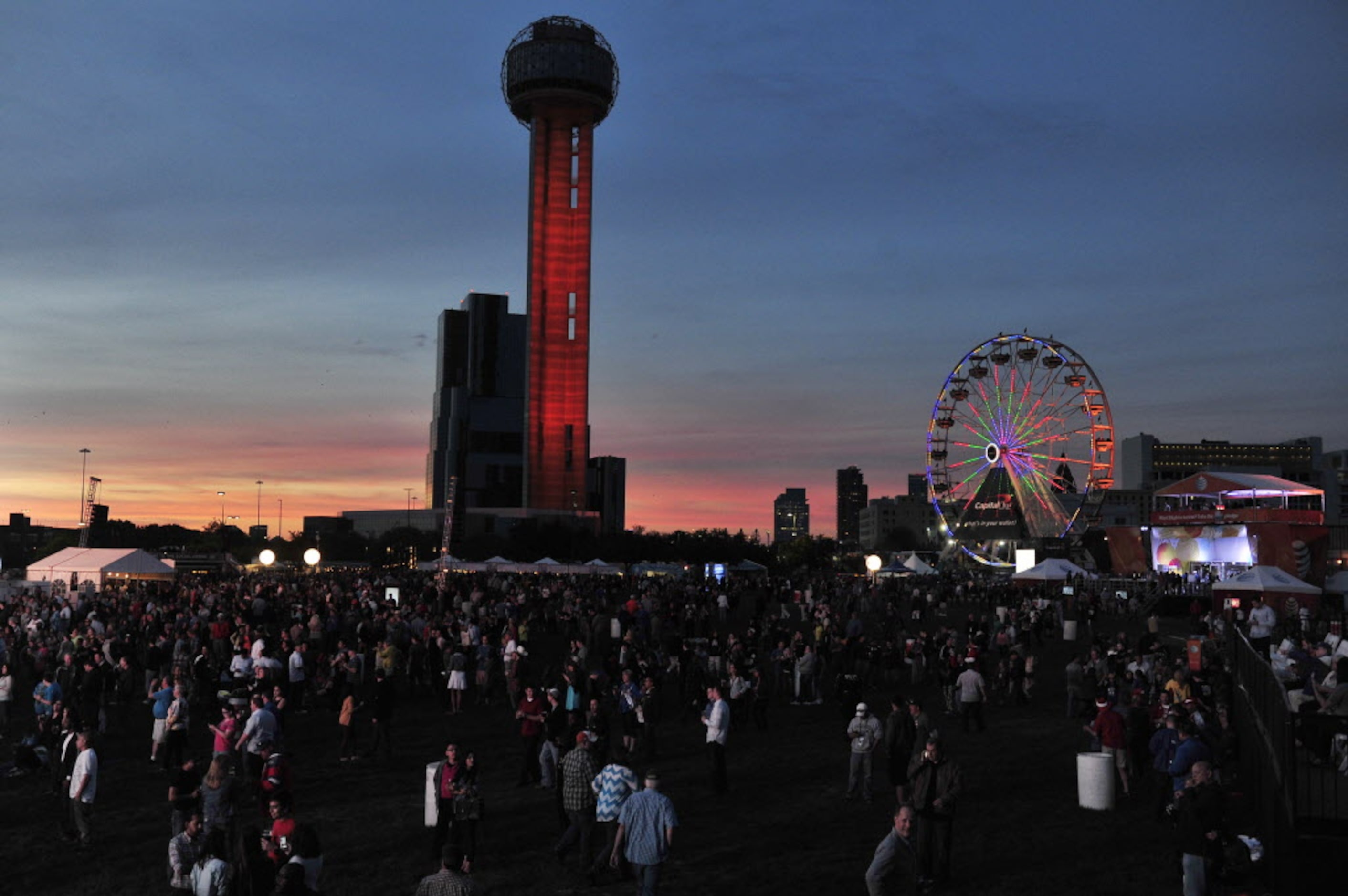 Fans gather before Jason Aldean performs onstage at the 2014 NCAA March Madness Music...