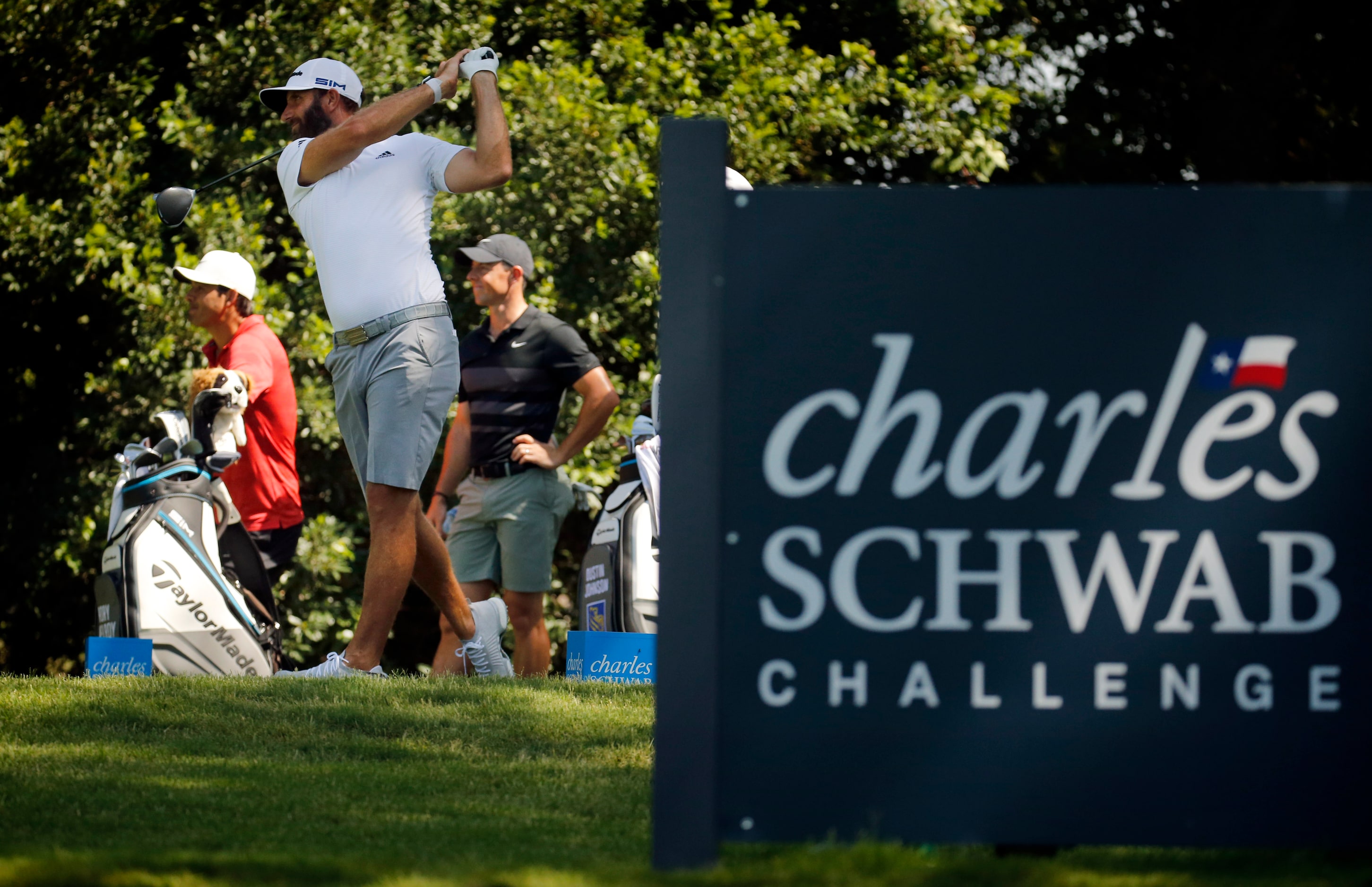 PGA golfer Dustin Johnson tees off on No. 12 during the Charles Schwab Challenge practice...