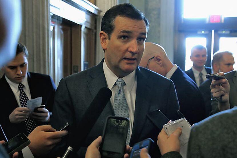 Texas Republican Sen. Ted Cruz speaks to reporters following a GOP policy luncheon Tuesday...