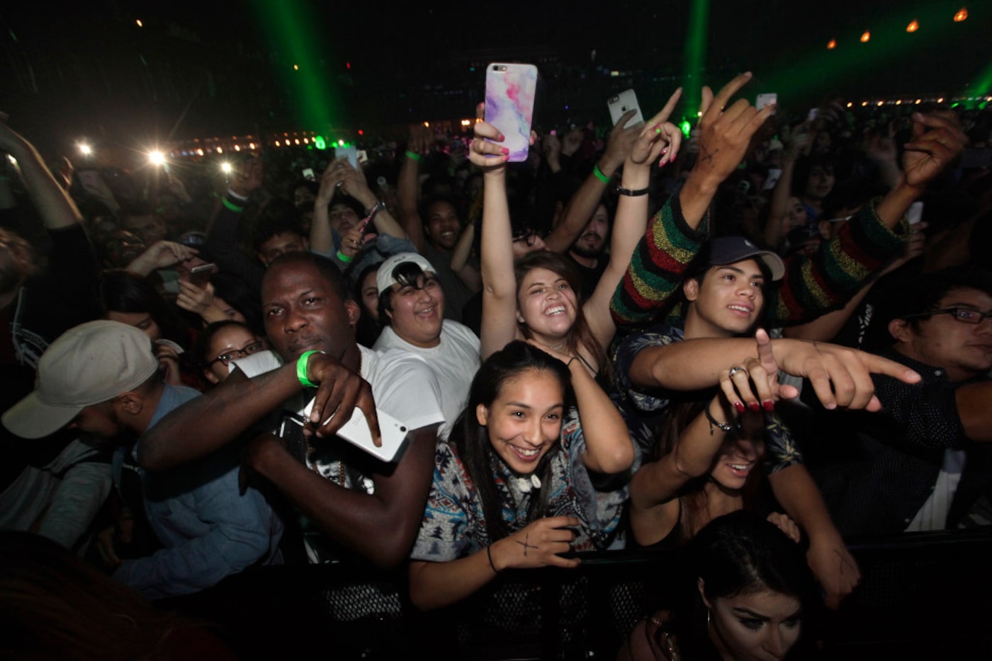 The crowd cheers as Wiz Khalifa performs at The Bomb Club in Dallas, TX, on Nov. 18, 2016....