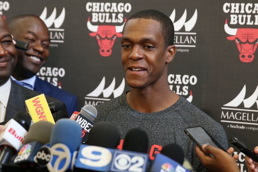 Newly acquired Chicago Bulls guard Rajon Rondo talks to the media during a press conference...